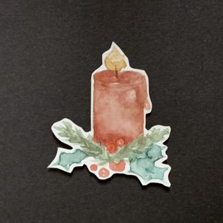 A candle with mistletoes