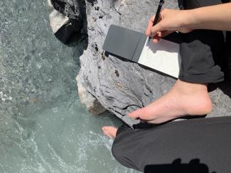 Sketching on a rock