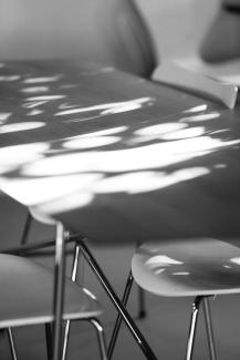 A table with sunlight shining through the window
