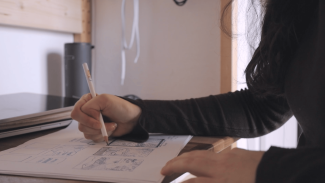 a close up of me while sketching