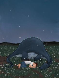 a boy sleeping next to a dragon