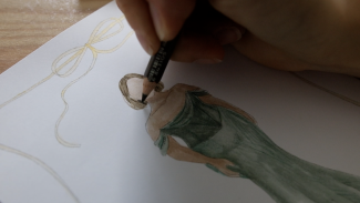 adding details with a coloured pencil