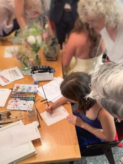 me during live illustrating at a wedding