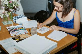 me while live illustrating at a wedding