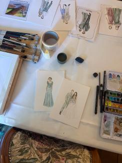 my table at a wedding fair in a castle, drawing live, watercolour, fashion illustration, aesthetic, vivisvorld