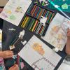 three girls while drawing 